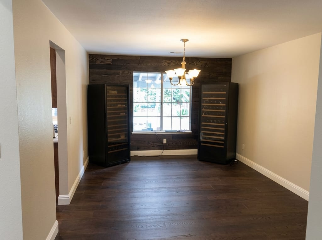 Whole-home structural remodel: Hardwood plank flooring and seamless transition to dining space