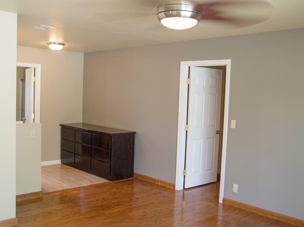 Remodeled master bedroom opening to a new walk-in closet addition
