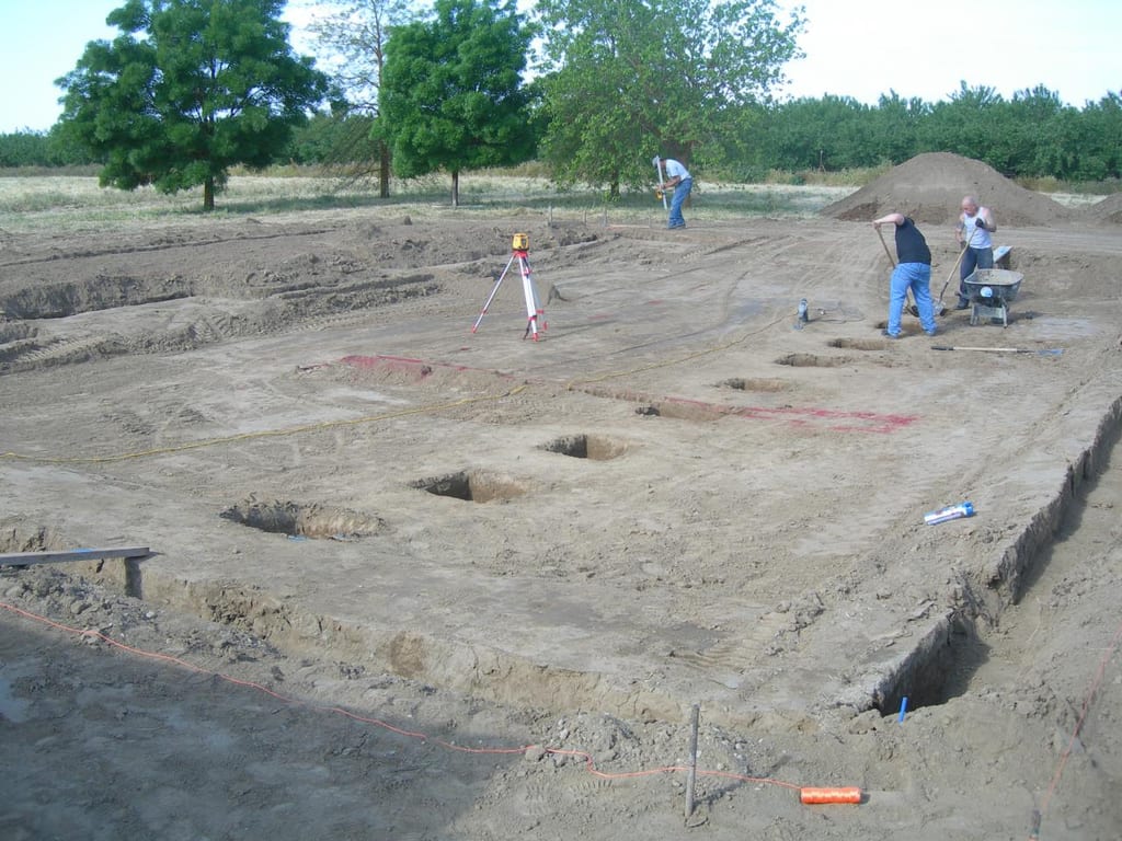 Chowchilla custom home foundation and groundwork: Setting perimeter wood forms and underground drain plumbing
