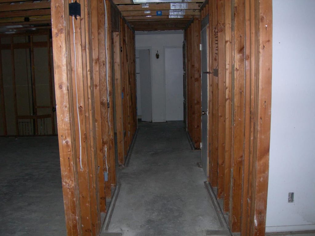 Structural fire damage rebuild: Demolition of fire-damaged timber and structural shoring installation