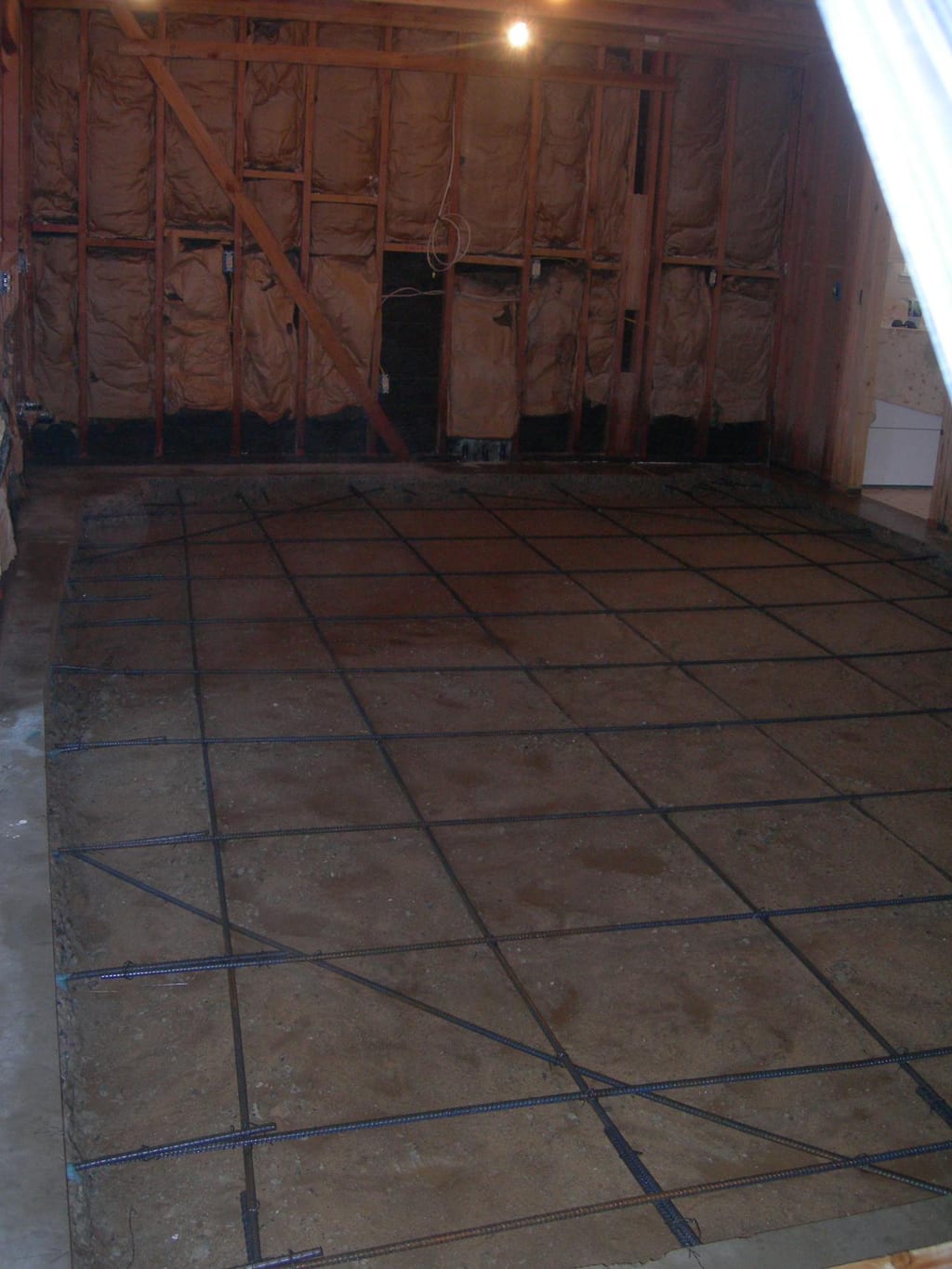 Benwell 1978 kitchen and foundation rebuild: Setting slate-toned floor tiles and ceramic countertop bases