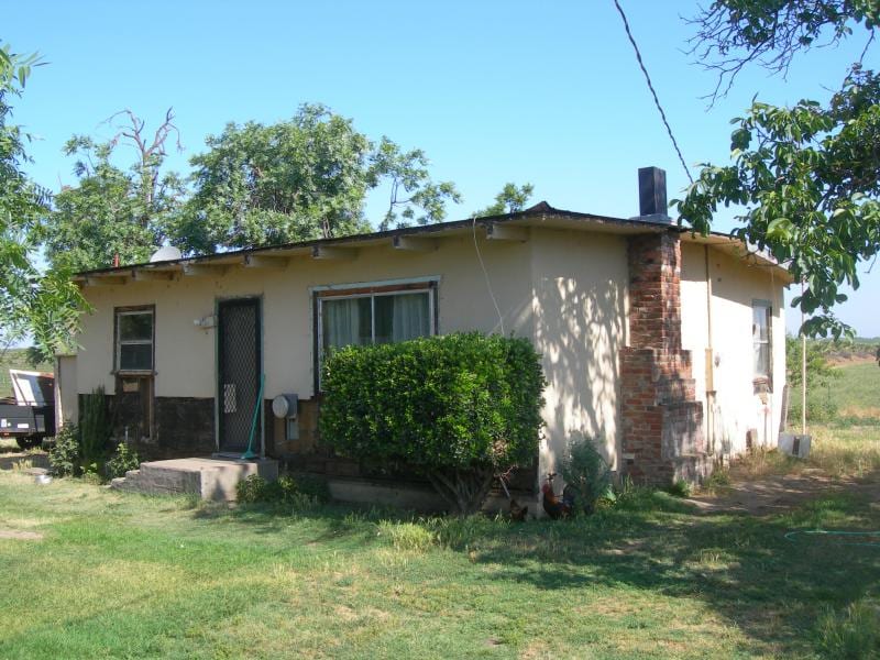 Before: Magneson foundation lift and exterior remodel: before and after, before work began