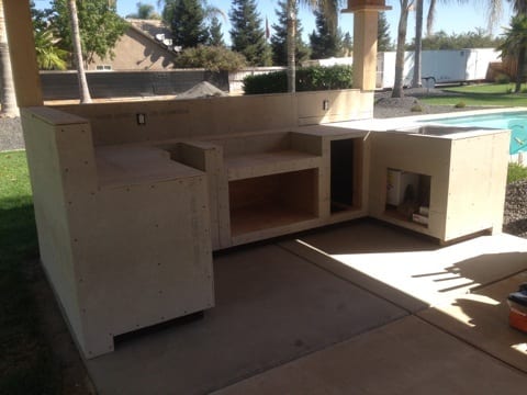 Covered stone outdoor kitchen: Covered stone outdoor kitchen: construction progress and structural craftsmanship