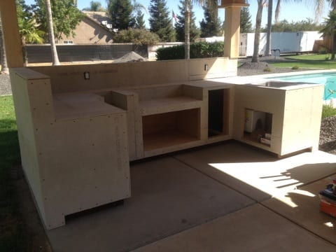 Covered stone outdoor kitchen: Covered stone outdoor kitchen: construction progress and structural craftsmanship
