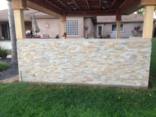 Covered stone outdoor kitchen: Covered stone outdoor kitchen: construction progress and structural craftsmanship