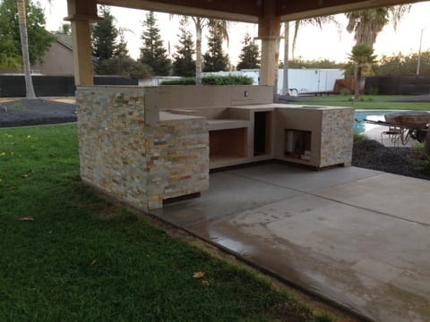 Covered stone outdoor kitchen: Covered stone outdoor kitchen: construction progress and structural craftsmanship